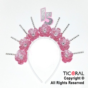 VINCHA PRECINTOS MIS 15 CON FLORES ROSA Y DECO PLATA x 1